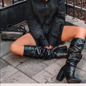 Black slouchy knee boots